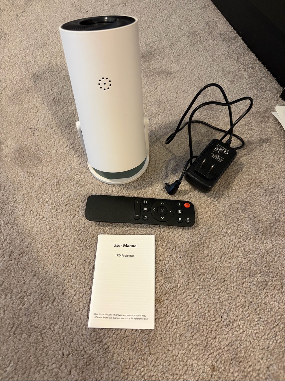Compact White Portable LED Projector with Remote and Power Adapter - Picture 4 of 4